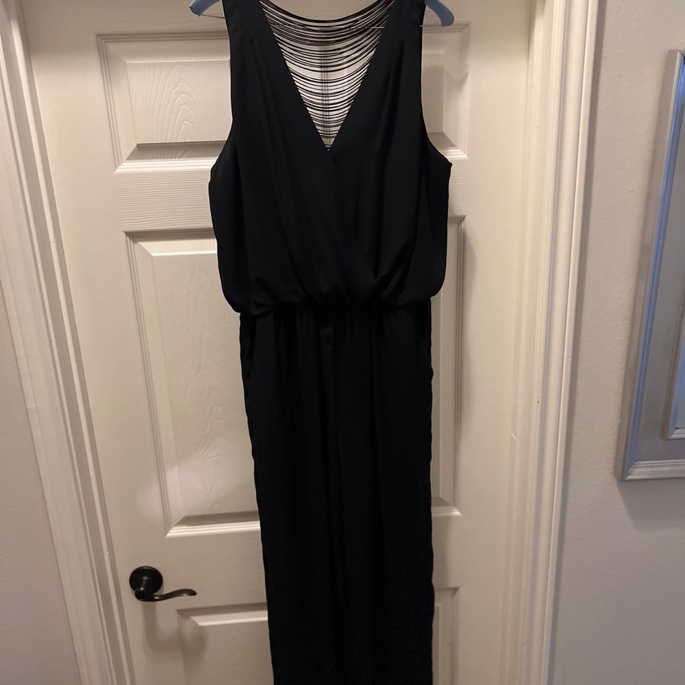 Black romper, great for cocktail parties!  Worn one time.